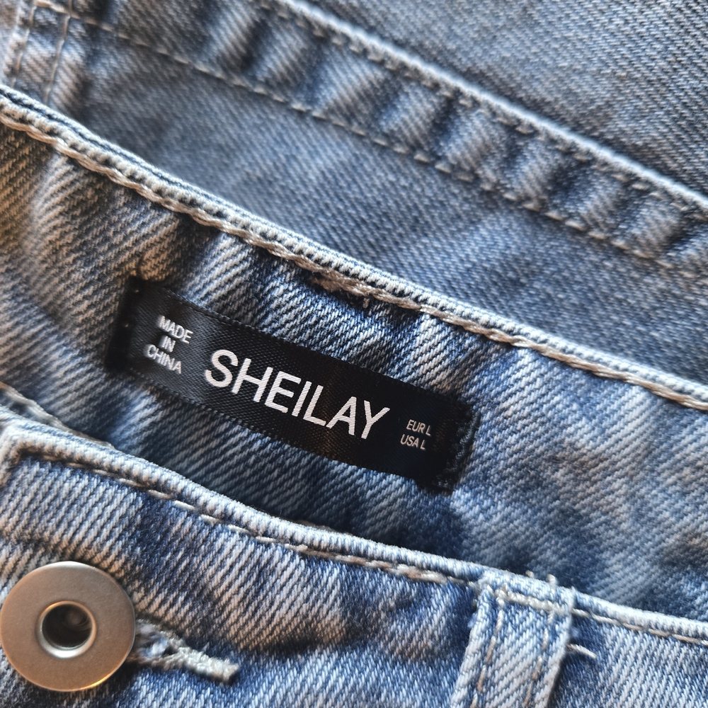 Stylish Light Blue Distressed Denim Shorts With Cheetah Accent - Picture 4 of 4